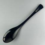 Titanium quenelle spoon designed for precise plating and elegant presentation